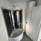 Contentor com escritório, cozinha, casa de banho e duche, com 6,00 x 2,43 m.
